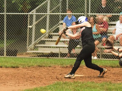 Megan Fouse gets a hit against the Diamonds Monday night.